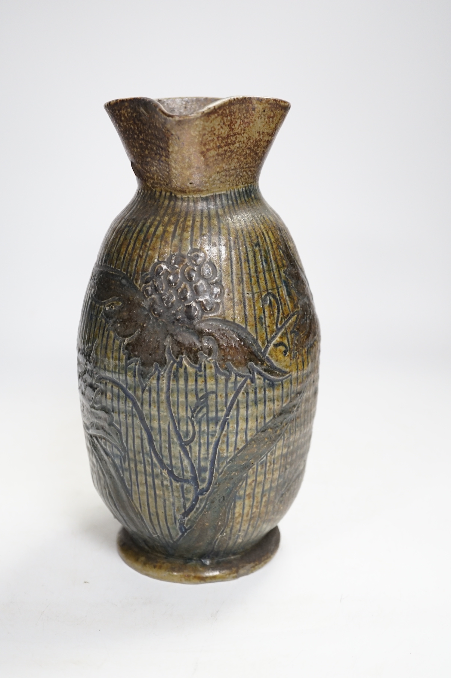 A R W Martin Brothers, London and Southall stoneware jug, repaired, mark to base, 22cm high